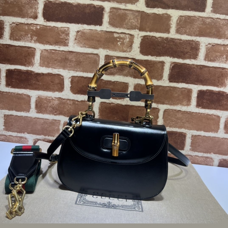 G*u*i top handle bags